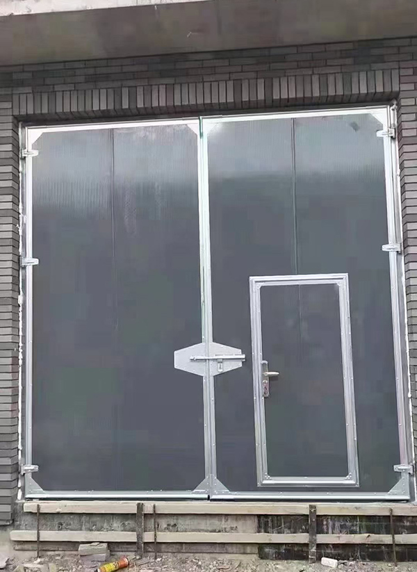 民和工业平开门在大型设备制造车间的应用实例